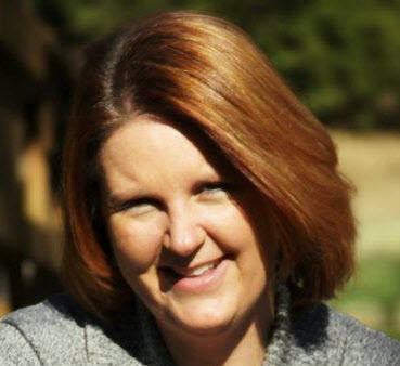 Picture of Michelle, a white middle-age woman with red hair